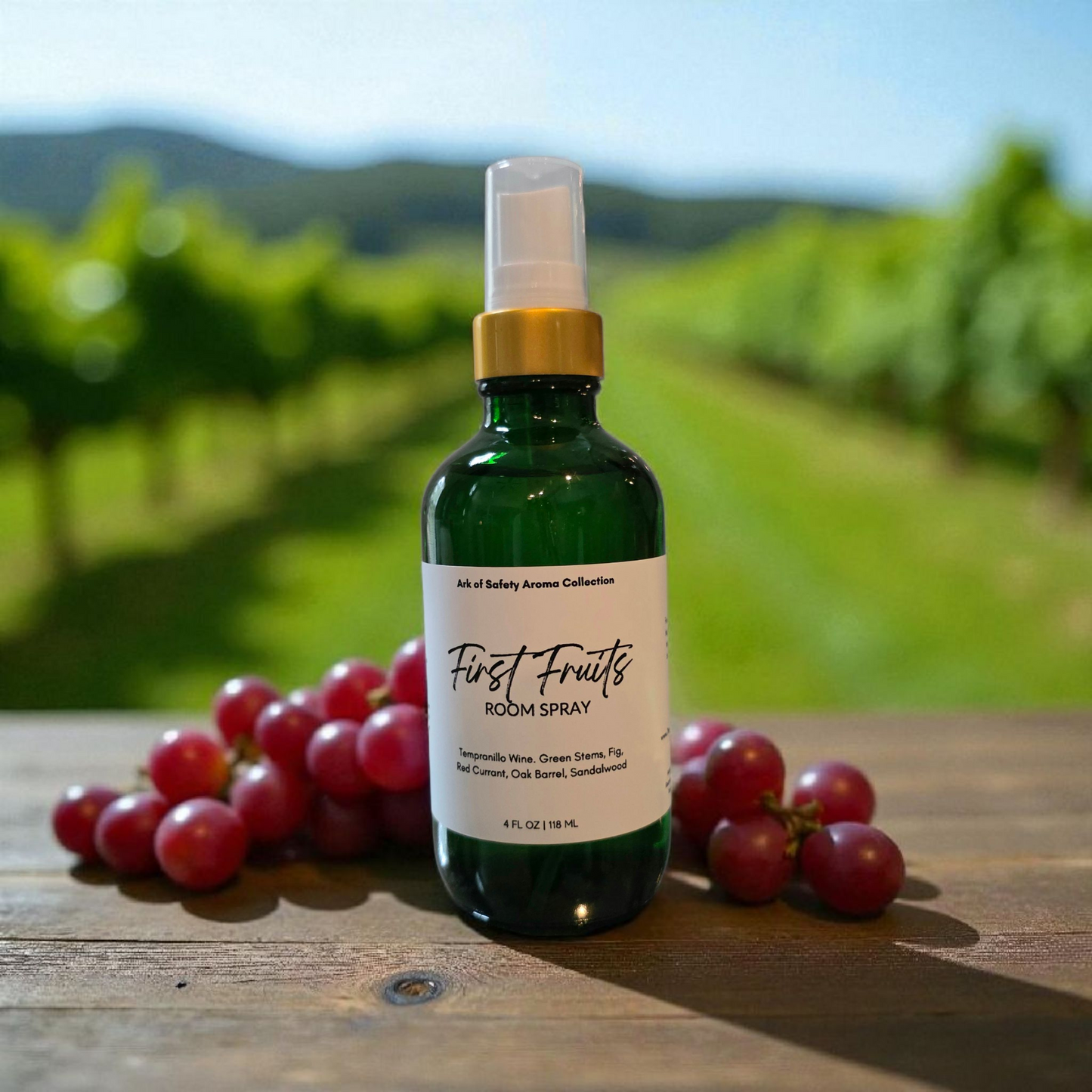First Fruits room spray by Restoring Balance Holistic, a luxury faith-inspired fragrance with muscadine grape, pomegranate, pear, green vine, berry, and wood notes.