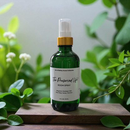 The Preserved Life room spray by Restoring Balance Holistic, a faith-based fragrance with bergamot, Himalayan salt, river moss, vetiver, and petrichor in a calm natural setting.